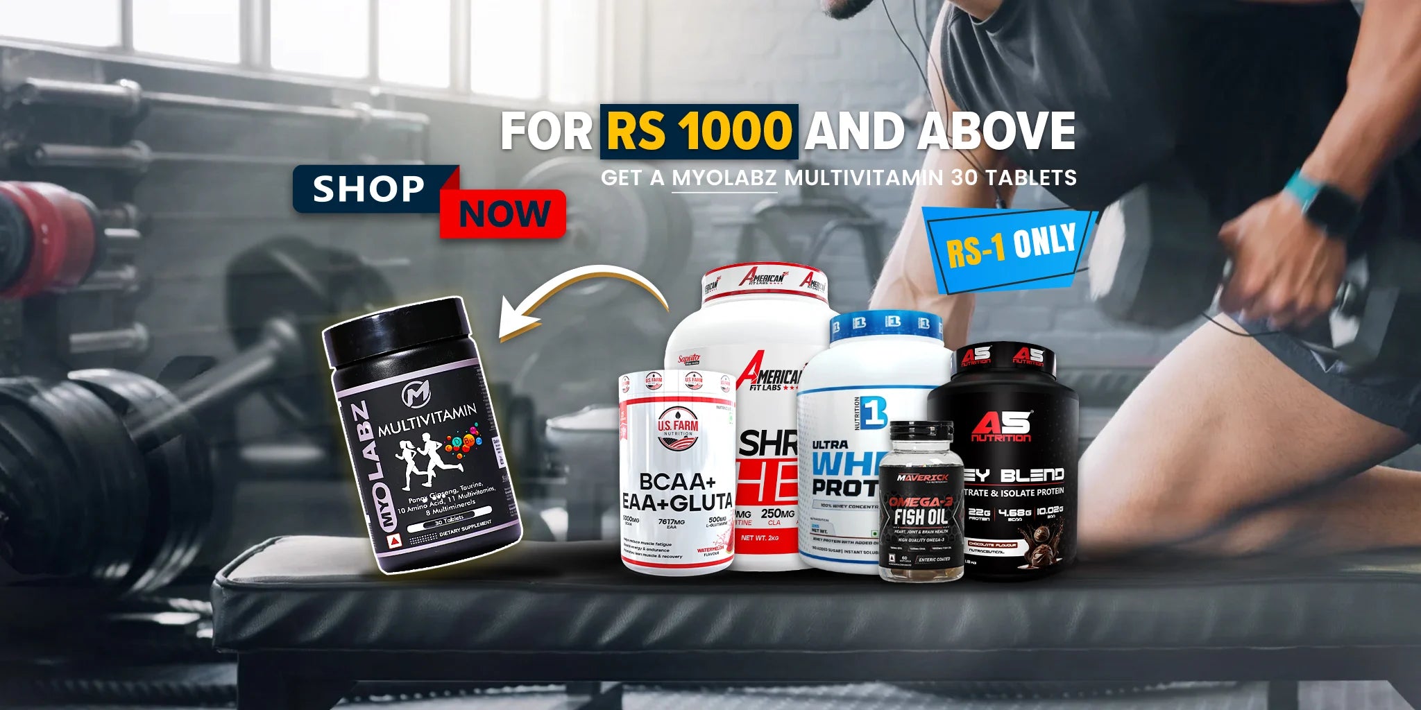 Supplement products on a gym bench with promotional text and graphics.